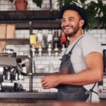 happy man in coffee shop